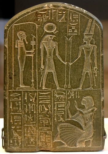 Egyptian Stele, typical round-top stone tablet, in Louvre Museum of Paris, Egyptian Antiquities Department, 1st Floor, Room 38, Artifact E-7717
